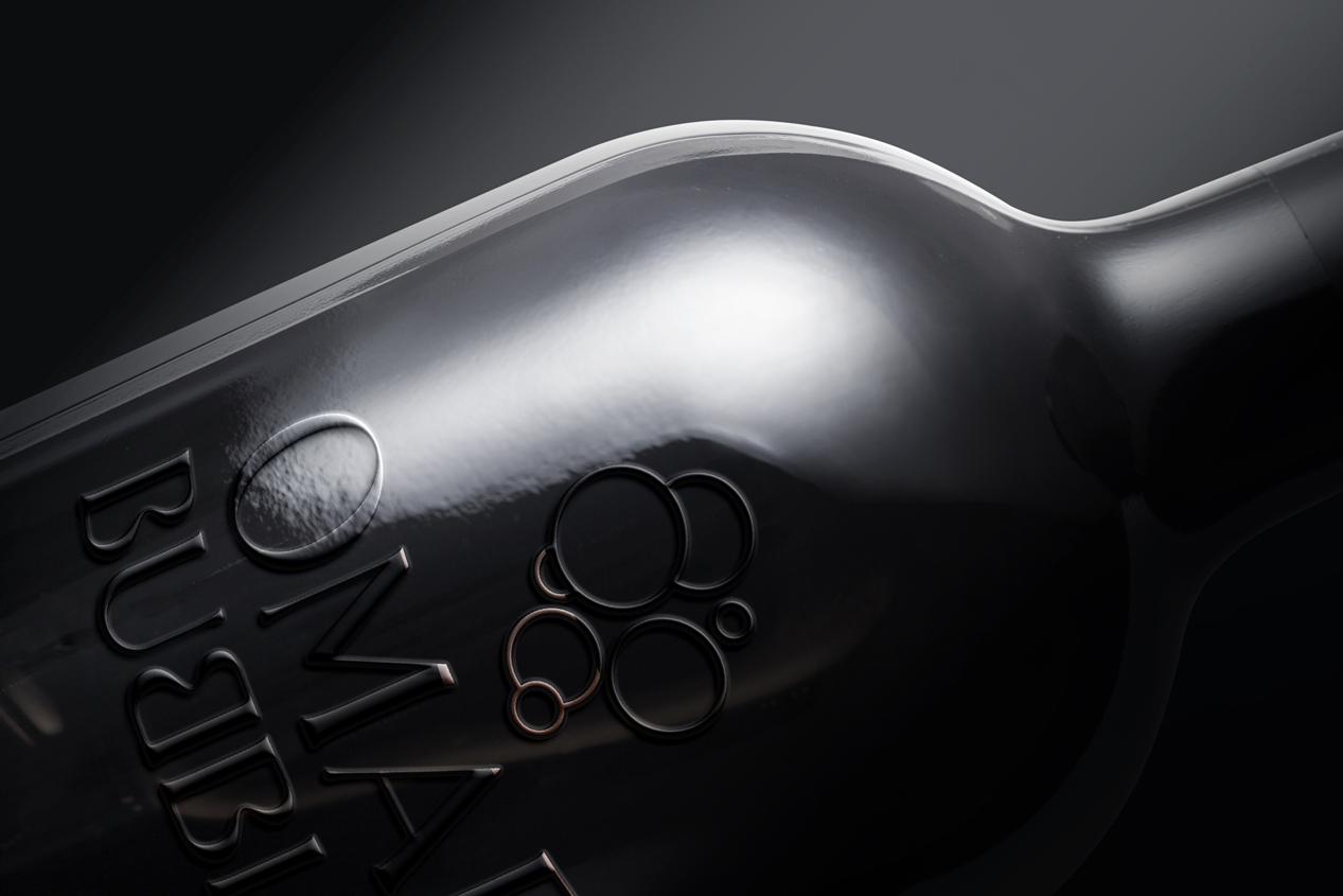 Logotipo de Omar Bubbles grabado en vidrio